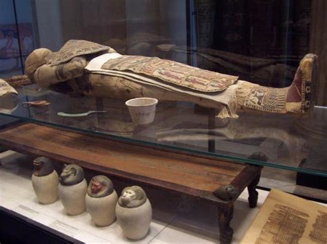 A Mummy With Jars In The Louvre Photo