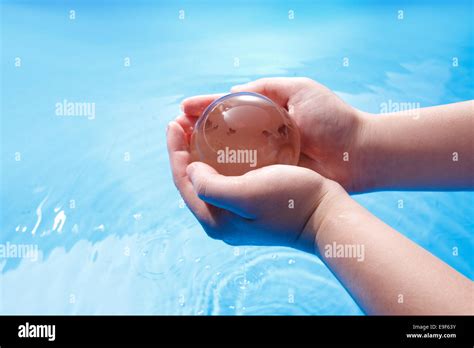 Hands And Crystal Ball Stock Photo Alamy