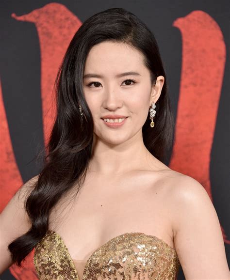 Liu Yifei Wearing Gold Elie Saab Gown At Mulan Premiere Popsugar Fashion