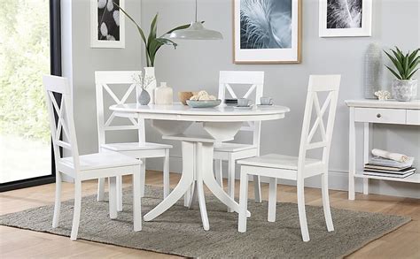 Buying chesterfield dining chairs is an excellent, durable choice, thanks to the craftsmanship and the use of the highest quality materials. Hudson Round White Extending Dining Table with 6 Kendal ...