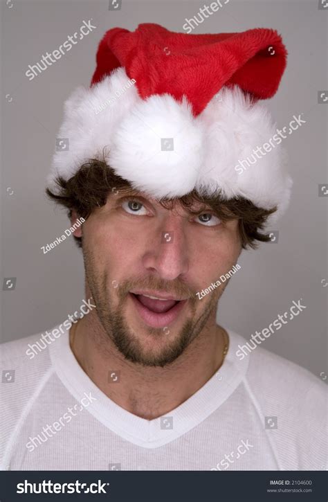 Funny Christmas Man Wearing Red Santa Hat Stock Photo 2104600