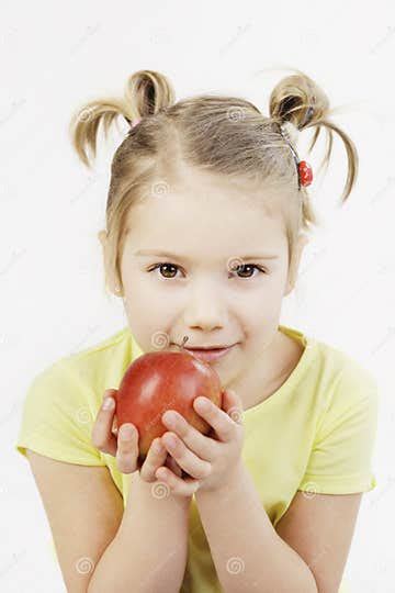 Little Girl Holding An Apple Stock Photo Image Of Happiness Holding