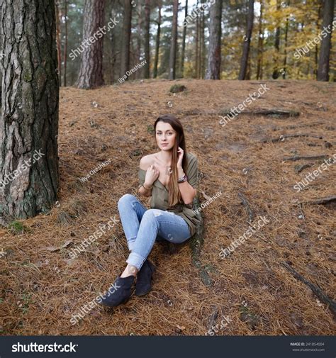 Beautiful Girl On Nature In The Forest Stock Photo