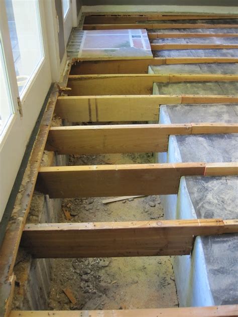 Redgard mat is designed differently than. Replacing Joists, Subfloor, And Hardwood On Top Of Partial ...