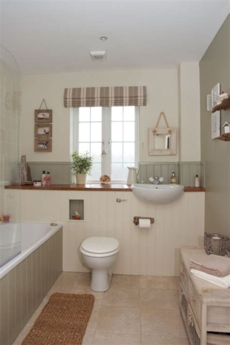The pristine white tub, sink, and medicine cabinet really pop against the ridged ceiling, stone walls, and wood floors. 54 Small Country Bathroom Designs Ideas | Country bathroom ...