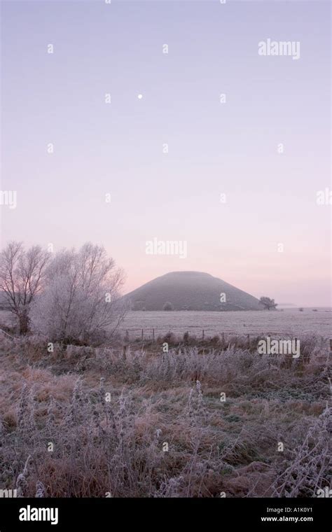 Silbury Hill Wiltshire England On Misty And Frosty Winter Morning