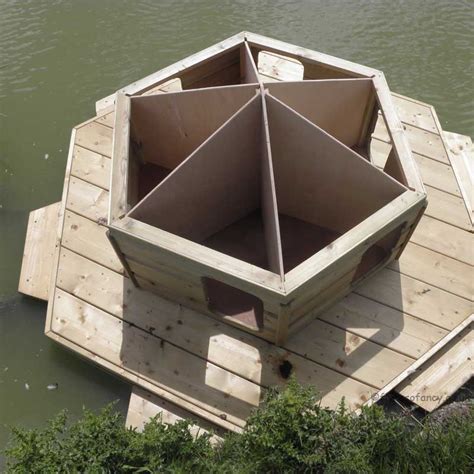 One solution is to build a do it yourself floating nest which keeps the ducks and ducklings safe from both dangers. Floating Duck House Lodge | UK made Waterfowl Houses