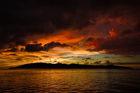 Colorful Sunset Over Rippled Water Stock Photo Image Of Island