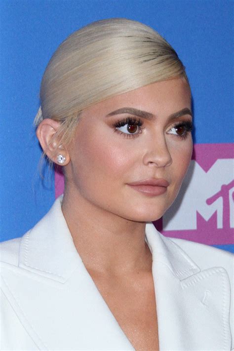 Kylie Jenner Straight Platinum Blonde Bun Dark Roots Hairstyle Steal Her Style