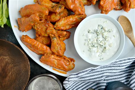 Remove the chicken from the buttermilk and drop into the dusk, coat the chicken in the dust. Simply Scratch Spicy Garlic Chicken Wings with Blue Cheese ...