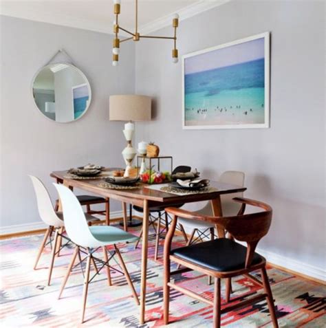 In this boho dining room, a colorful rug in shades of magenta, yellow, and blue invigorates the space with boho energy—its vibrant palette is echoed in the room's accessories. Bohemian Dining Room Ideas: 24+ Catchy Decors with ...