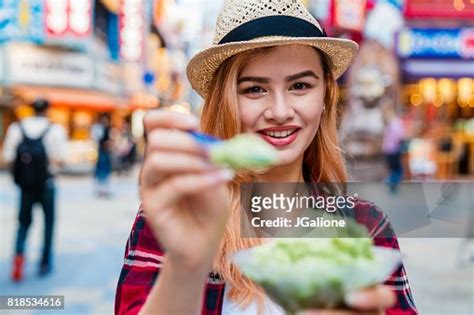Pov Of A Beautiful Tourist Offering Japanese Green Tea Shaved Ice To The Camera High Res Stock