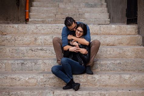 Romantic Couple Sitting On Stairs At For Photoshoot In Sicily Italy Couple Photoshoot Poses