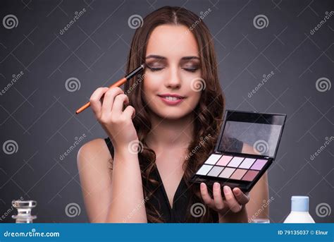 the beautiful woman applying make up in fashion concept stock image image of fashion cute