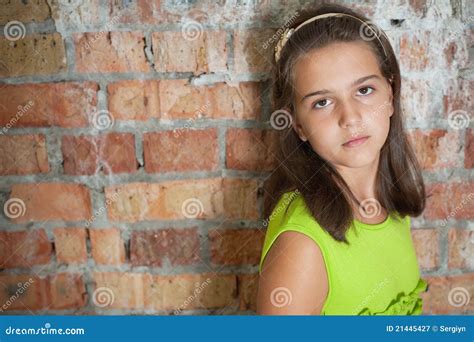 Sad Girl In Front Of A Brick Wall Stock Image Image Of Concepts