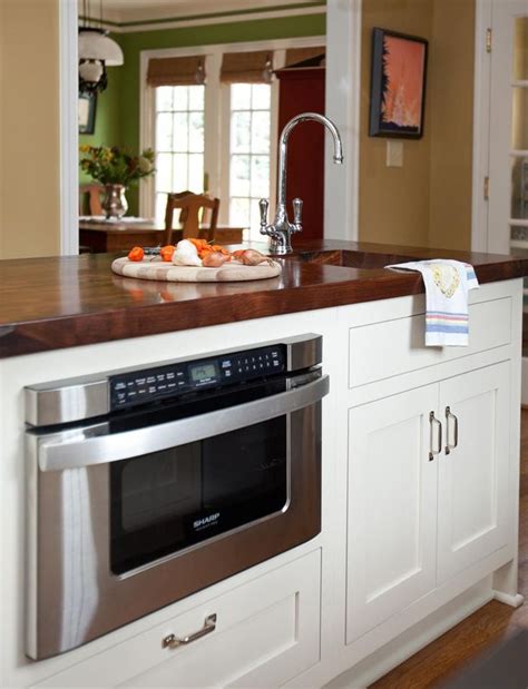 This toaster oven has a high=temperature glass window that makes it easy to watch your bread as it toasts. This Retro Kitchen Is a Modern Blast From the Past ...