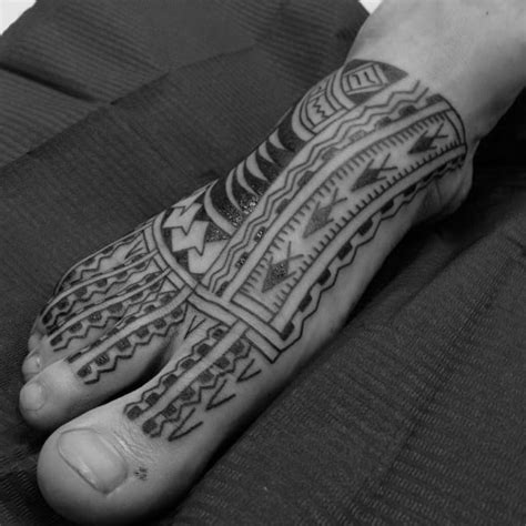 40 tribal foot tattoos for men [2023 inspiration guide]