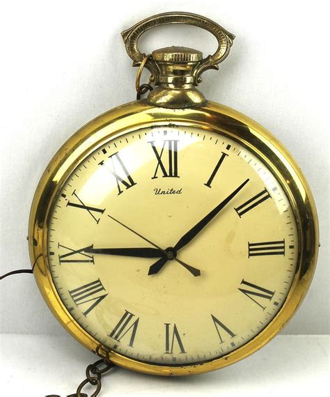 United Clock 13x17 Vintage Brass Hanging Pocket Watch Wall Clock Model