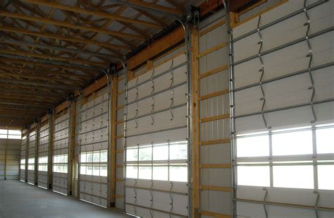Measure the distance from the bottom plate of the wall to a point that is 1 1/2 inches higher that the garage door height. Post Frame Building Door Options - Conestoga Buildings
