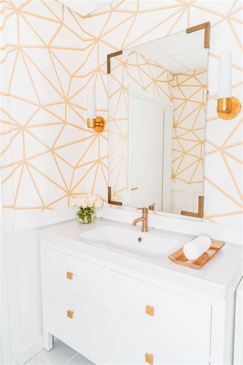 Midcentury Wallpaper And Mirror Create An Elegant Bathroom