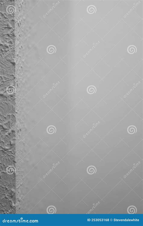 Corner Section Of Drywall With A Stomp Brush Style Texture From The
