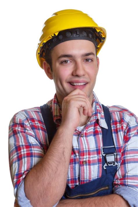 Attractive Young Construction Worker Looking At Camera Stock Photo