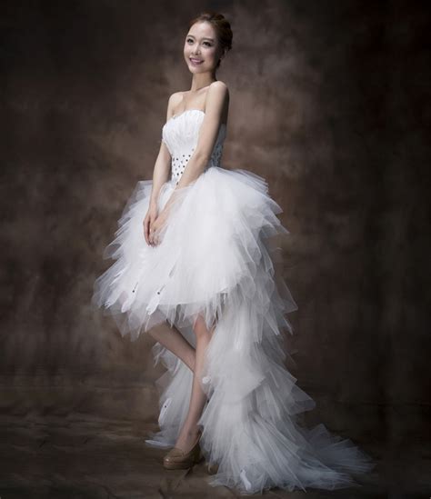 And lately, bridal designers are. White Feather Wedding Dress, white burlesque style wedding ...