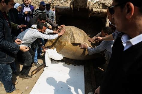 newly discovered 26ft high egyptian statue of ancient pharaoh starts journey to cairo museum