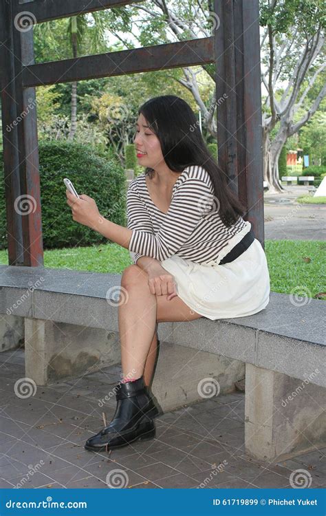 Asian Women Playing Phone In The Park Stock Image Image Of Adult Copy 61719899
