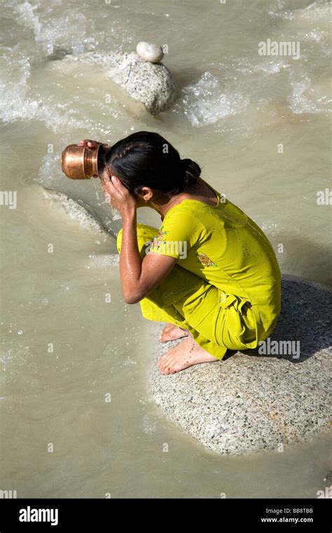 girl bathing at the ganges river gangotri uttarakhand india stock