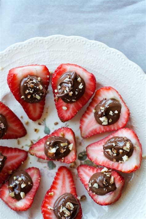 Transfer the strawberry whipped cream into a piping bag, and pipe into each strawberry. Nutella Deviled Strawberries (Video) | Lauren's Latest