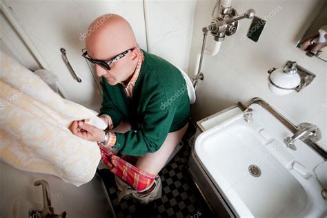 Man Sitting On A Toilet In Train Stock Photo Vilevi