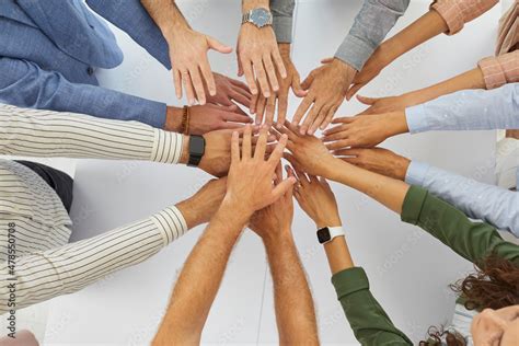 Team Of People Joining Hands In Corporate Meeting Group Of Coworkers