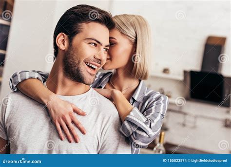 Selective Focus Of Handsome Boyfriend And Attractive Girlfriend Hugging