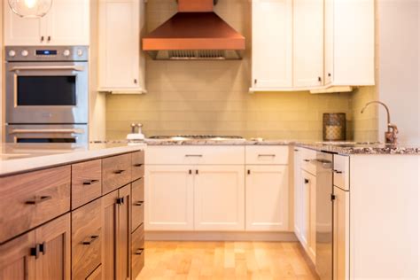 Countertops cutting boards & chop blocks decorative cabinet hardware door hardware floor fixed kitchen islands are usually larger and feature ample room for storage. Walnut Kitchen Island with White Cabinetry, Copper Hood ...