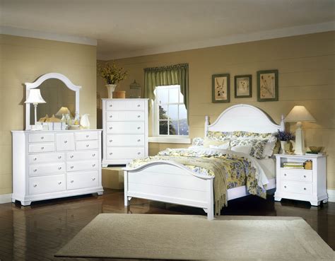 A beautiful vintage modern bedroom set that includes a low dresser, highboy dresser, and two nightstands. Vaughan-Basset Cottage Collection Panel Bedroom Set in ...