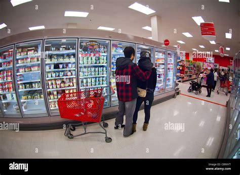 Shoppers In A Frozen Food Aisle In The Grocery Department In A Target