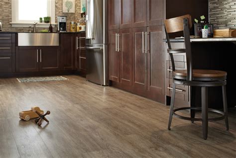 The floor has a realistic wood look and feel which really transformed this space by making the other kitchen updates appear more cohesive. Luxury Vinyl Flooring Tile (LVT) / Planks (LVP) - Modern ...