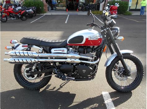 This is our beautiful triumph scrambler 2014, 14 in silver / red with only 8877 miles, full service history, one previous owner, full arrow exhaust system. 2014 Triumph Scrambler Two-Tone for sale on 2040-motos