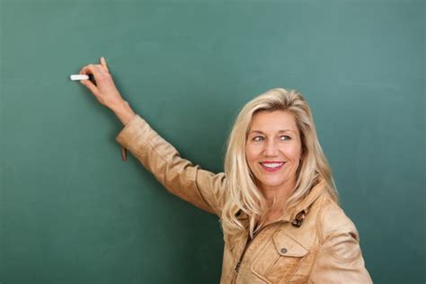 Woman Teacher Writing On Blackboard Stock Image Everypixel
