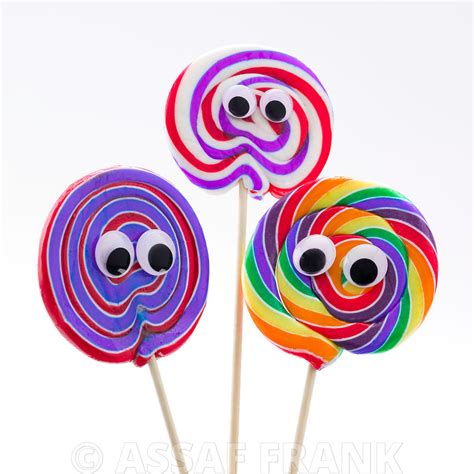 Assaf Frank Photography Licensing Human Faced Swirl Lollipop Candies