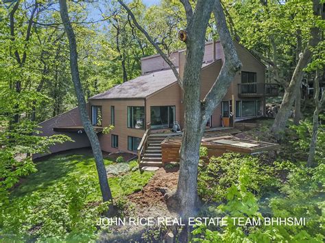 Experience the best waterfront living in Grand Rapids. This gorgeous