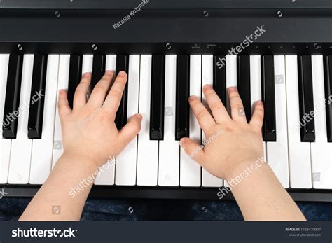 Hands Young Child Playing Piano Learning Stock Photo Edit Now 1728470977