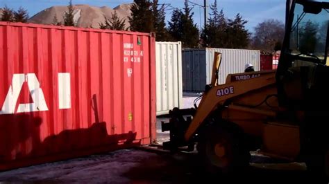 How To Move A Shipping Container With A Back Hoe Youtube