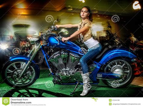 Cars, bikes, girls.under 18 please leave now! Attractive Girl Sitting On A Blue Motorcycle, Moto Show ...