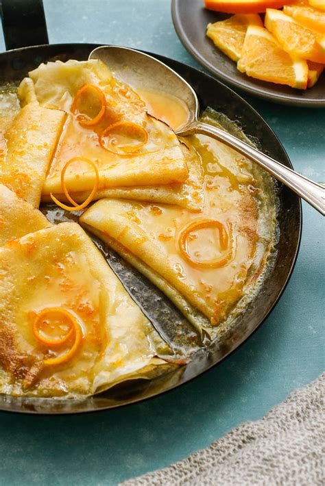 This easy crepes suzette recipe features orange crêpes with a buttery grand marnier orange sauce. Crêpes Suzette Recipe - NYT Cooking