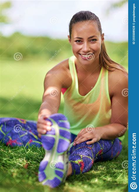 Stretching Is As Important As Exercise A Young Woman Stretching Her