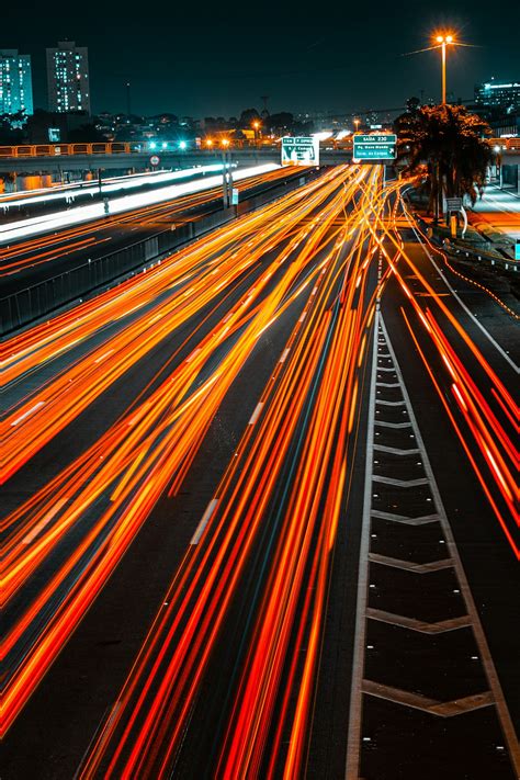 Time Lapse Photography Of Cars On Road During Night Time Photo Free
