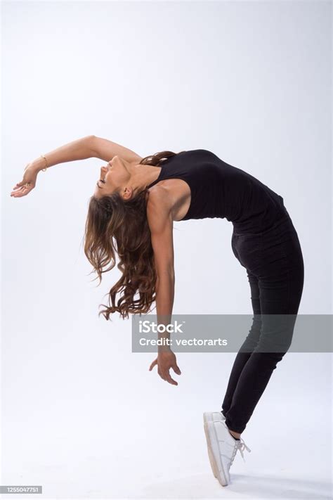 Lady In Black Bending Over Backwards Stock Photo Download Image Now