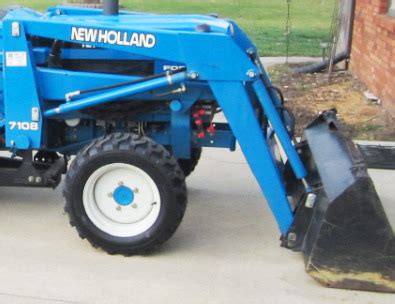New Holland 7108 Loader Specifications And Review